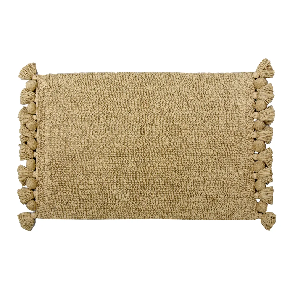 Kylpyhuonematto tupsuilla beige